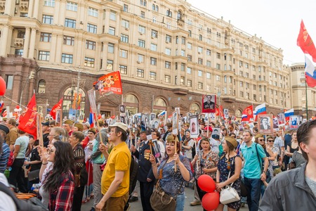 Moscow, Russia - May 9:  Immortal Regiment  marches on. Moscow celebrates 71-th Victory Day anniversary on May 9, 2016 in Moscow.のeditorial素材