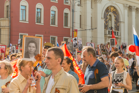 Moscow, Russia - May 9:  Immortal Regiment  marches on. Moscow celebrates 71-th Victory Day anniversary on May 9, 2016 in Moscow.のeditorial素材