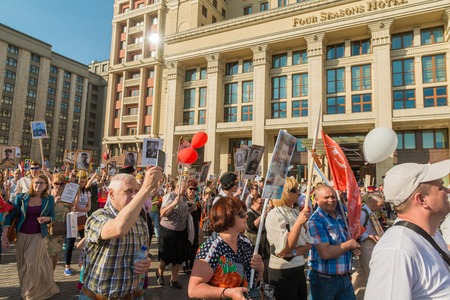 Moscow, Russia - May 9:  Immortal Regiment  marches on. Moscow celebrates 71-th Victory Day anniversary on May 9, 2016 in Moscow.のeditorial素材