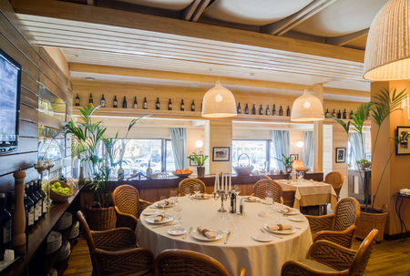 Moscow, Russia - April 26, 2011 - Restaurant interior with served tablesのeditorial素材