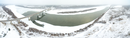 Aerial view of snow covered countrysideの写真素材