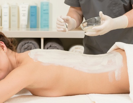 Massage on a woman at spa salonの写真素材