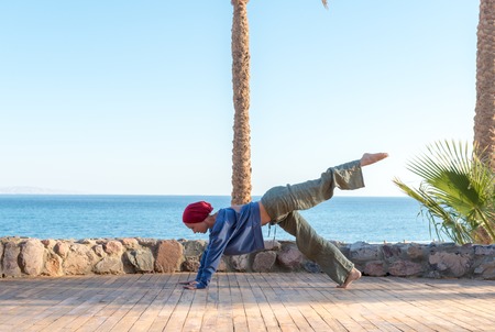 Yoga practice at the pierの写真素材
