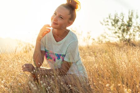 Beauty Girl Outdoors enjoying nature