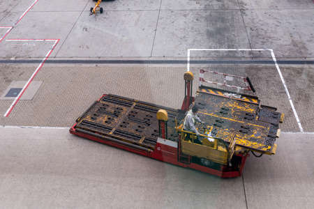 HONG KONG, CHINA - April 17, 2013: A cargo loader at Hong Kong airport on a flight field