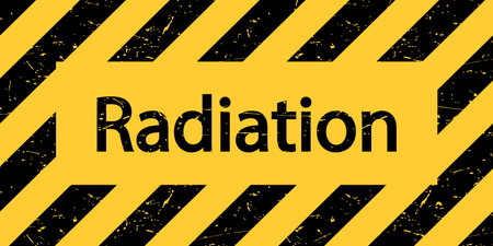 A plate with the inscription Radiation. Warning black and yellow sign. Vector illustrationのイラスト素材