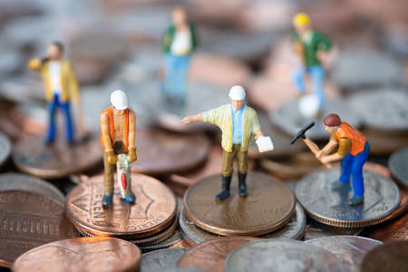 Conceptual photo of people working on the economy.の写真素材