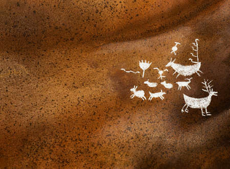 Prehistoric paintings on a cave's wall.の写真素材