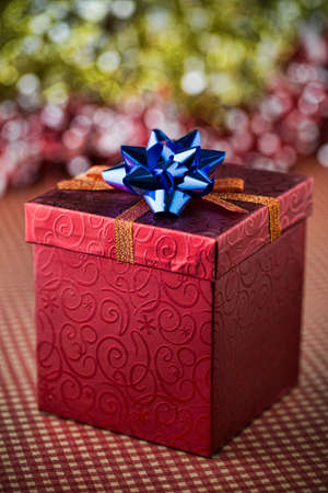 Nice gift box by the Christmas Tree.の写真素材