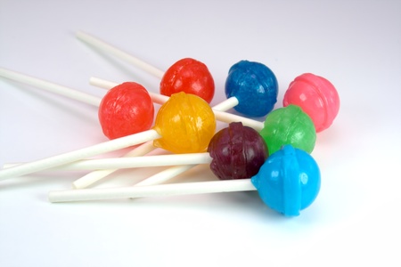 Stack of brightly colored lollipops