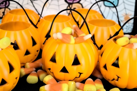 Jack o lanterns overflowing with candy corn
