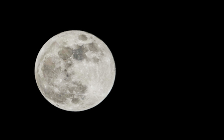 A closeup of the surface of the full blue moon