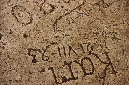 Ancient stone carving textureの写真素材