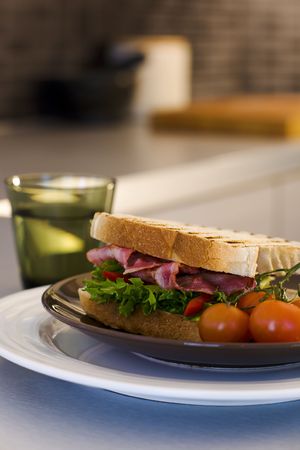 Bacon and lettuce sandwich on the kitchen table の写真素材