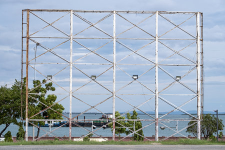 Blank steel billboard structure for outdoor advertising poster or advertisement in front of a seascapeの写真素材
