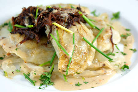 Short Rib Pierogies - filled with slow braised short ribs and mushroom sauceの写真素材