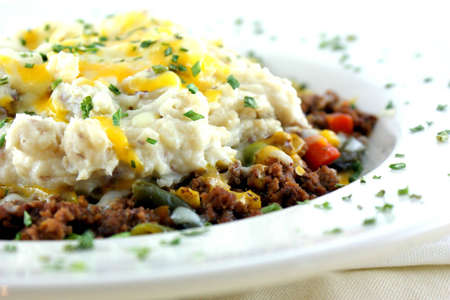 Shepherds Pie - Beef and a medley of veggies served under redskin mashed potatoes, topped with provolone, cheddar and mozzarella cheese の写真素材