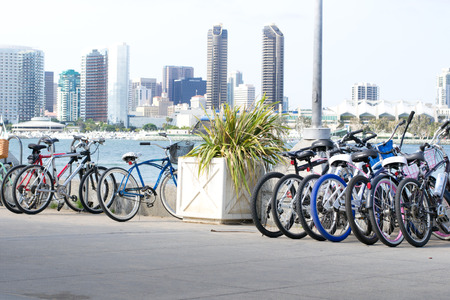 Row of bikes with city view 