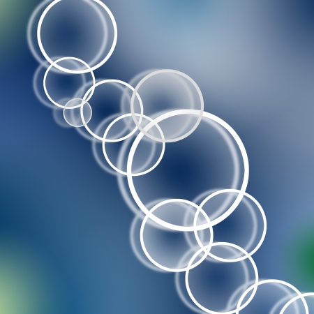 Blue abstract background with white ringsの写真素材