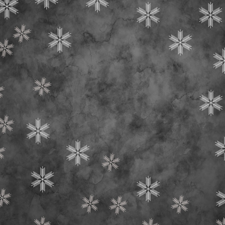 Abstract snowflakes in front of a gray background. Symbol for icy cold winterの写真素材