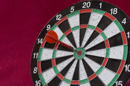 Dart on the red arrow in the centerの写真素材