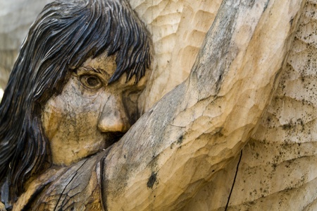 a close up to the wooden sculpture at de glindの写真素材