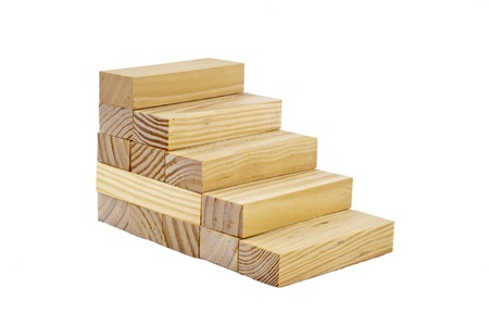 Wooden blocks  made by stairs in the white isolated backgroundの写真素材
