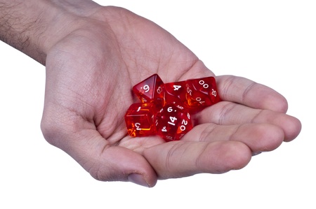 Fantastic role play dice set in the palm of young manの写真素材