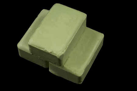 three Olive oil Soaps on the black backgroundの写真素材
