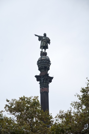 Columbus statue showing the usa  in barcelona spainの写真素材