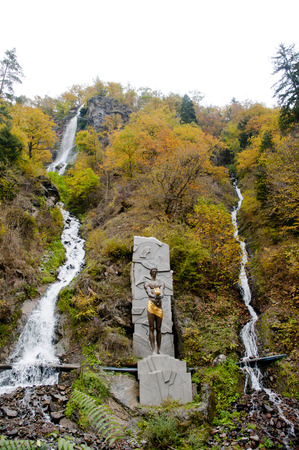 Natural Water Fountain and Symbol statue of Park Borjomi Georgia Mountainsの写真素材