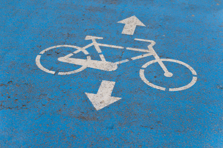 Blue Bicycle Road sign on the Asphalt ground for markingの写真素材