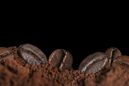 coffee beans isolated on blackの写真素材