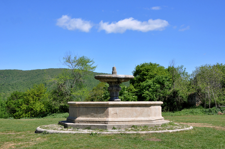 The octagonal fountain in front of the church of San Bonaventura, Canale Monterano,  central Italian region of Lazio Ancient Latiumの写真素材