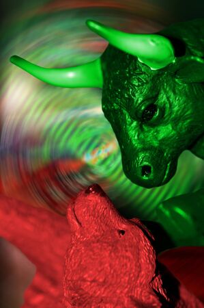 Red bear and green bull fighting financial trading market conceptの写真素材