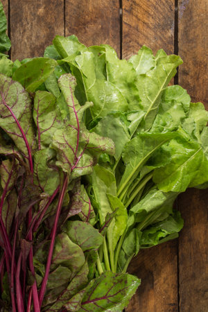 Beet Leaves On The Wooden Background