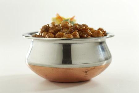 Indian Food Chana Masala in stainless steel pot.の写真素材
