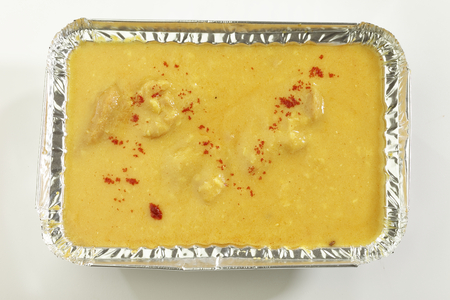 Indian Food Kadhi with gatte in metal tray.の写真素材