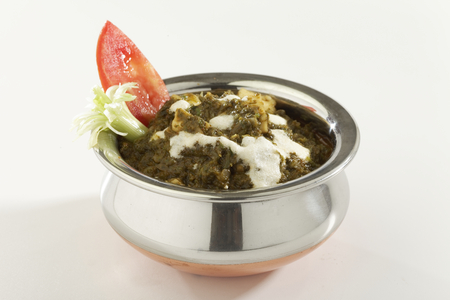 Indian vegetable Spinach with cottage cheese with raw vegetables.の写真素材