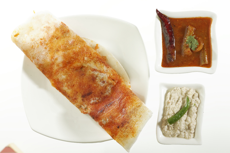 Indian fast food Mysore Masala Dosa Stuffed With Aloo Masala Chutney And Sambhar.の写真素材