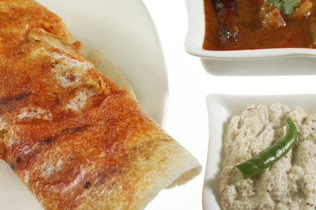Indian fast food Mysore Masala Dosa Stuffed With Aloo Masala Chutney And Sambhar.の写真素材