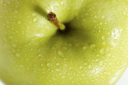 fresh green apple on a white background.の写真素材