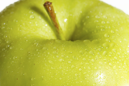 fresh green apple on a white background.の写真素材