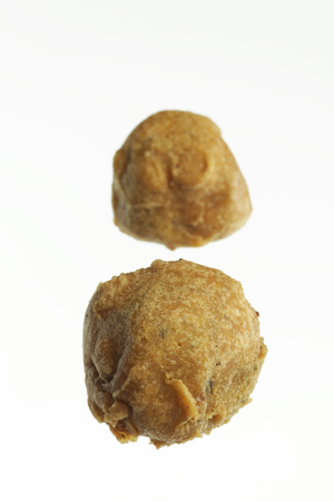 Fast food deep fried potato vada on white background.の写真素材