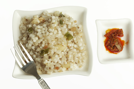 Fast food sago sabudana khichdi with picklesの写真素材