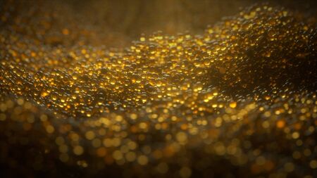 Abstract premium golden caviar-like particles shine on a dark background in the center of the...