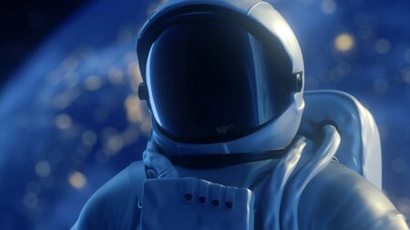 Portrait alone astronaut looks at the planet earth in orbit in outer space, the planet earth...