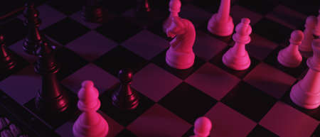Chess pieces on a chessboard in a colorful fashion style. Studio neon light footage. Pink and purple colors. Fashion, business concept. Depth of field, soft focusの写真素材