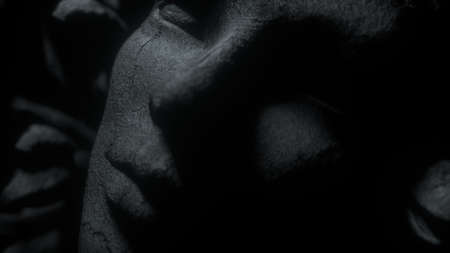 Antique stone female head sculpture isolated on black background. Ancient sculpture. Close-up, depth of field. 3d renderの写真素材