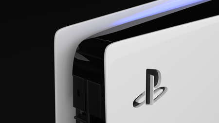 Moscow, Russia - March 20 2021: Home video game console. Wireless white device on black background....